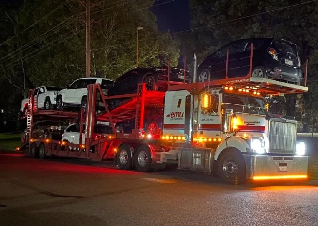 car carrier with cars on it